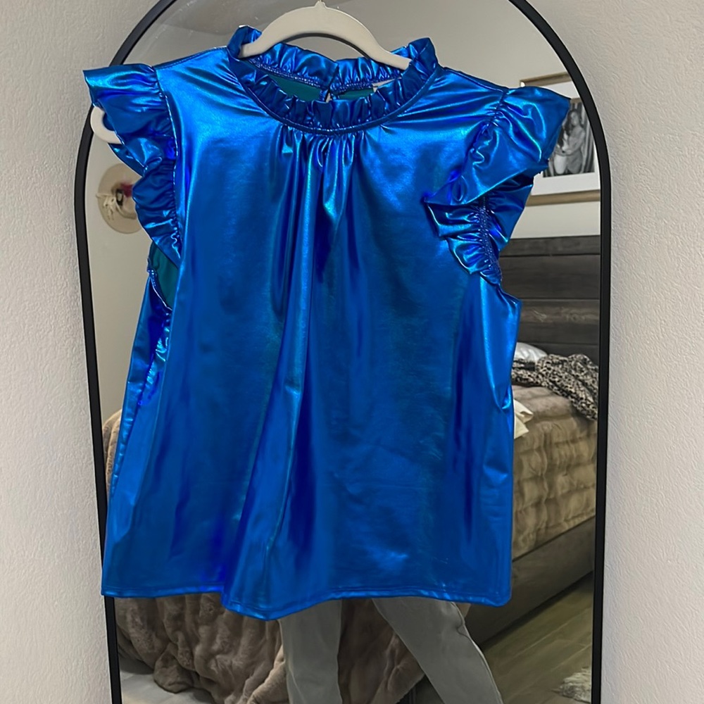 Metallic blue boutique top never worn.